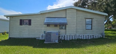 Furnished, spacious 2 bedroom 2 bath home in 55 + Resort style on Zephyrhills Municipal Golf Course in Florida - for sale on GolfHomes.com, golf home, golf lot