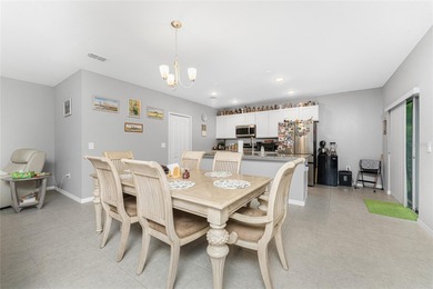 Impressive and spacious 4 Bedroom, 2 Bathroom home with attached on Deep Creek Golf Club in Florida - for sale on GolfHomes.com, golf home, golf lot