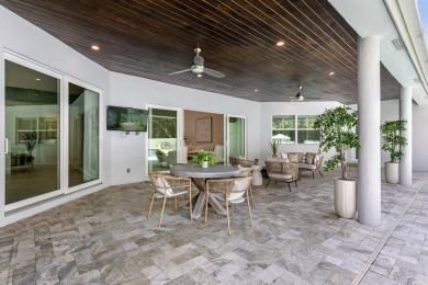 Stunning 5BD/3.1BA coastal contemporary home in exclusive on Seminole Golf Club in Florida - for sale on GolfHomes.com, golf home, golf lot