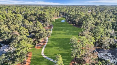 Immaculately maintained and beautifully appointed, this luxury on The Landings Club - Oakridge in Georgia - for sale on GolfHomes.com, golf home, golf lot