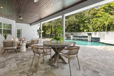 Stunning 5BD/3.1BA coastal contemporary home in exclusive on Seminole Golf Club in Florida - for sale on GolfHomes.com, golf home, golf lot