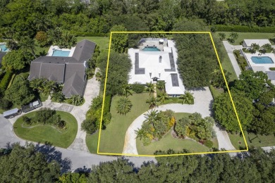 Stunning 5BD/3.1BA coastal contemporary home in exclusive on Seminole Golf Club in Florida - for sale on GolfHomes.com, golf home, golf lot