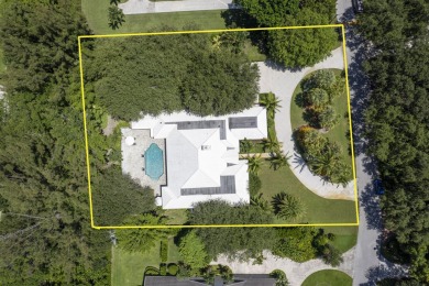 Stunning 5BD/3.1BA coastal contemporary home in exclusive on Seminole Golf Club in Florida - for sale on GolfHomes.com, golf home, golf lot