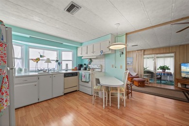 This beautifully maintained 2-bedroom, 2-bath furnished on Kings Gate Golf Club in Florida - for sale on GolfHomes.com, golf home, golf lot