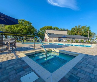 Furnished, spacious 2 bedroom 2 bath home in 55 + Resort style on Zephyrhills Municipal Golf Course in Florida - for sale on GolfHomes.com, golf home, golf lot