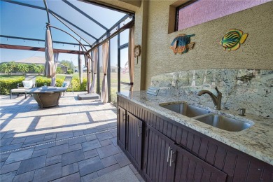 Welcome to 35 Medalist Road - the perfect blend of luxury on Rotonda Golf and Country Club - Long Marsh  in Florida - for sale on GolfHomes.com, golf home, golf lot
