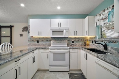 Adorable, updated, cute & cozy 2/2 Home in The Village of Santo on Tierra Del Sol Golf and Country Club in Florida - for sale on GolfHomes.com, golf home, golf lot