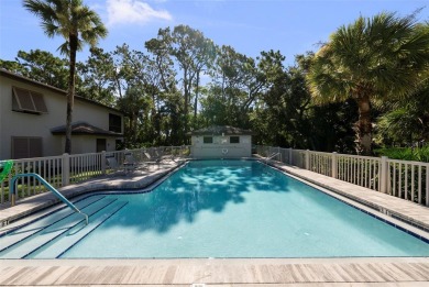 Nestled within the lush, park-like setting of The Meadows in on The Meadows Golf and Country Club in Florida - for sale on GolfHomes.com, golf home, golf lot