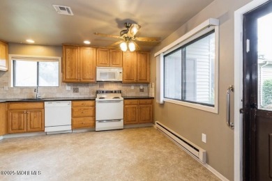 Welcome Home to Covered Bridge II! This fantastic end unit on Pine Brook Golf Course in New Jersey - for sale on GolfHomes.com, golf home, golf lot