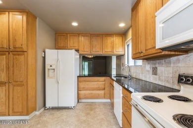 Welcome Home to Covered Bridge II! This fantastic end unit on Pine Brook Golf Course in New Jersey - for sale on GolfHomes.com, golf home, golf lot