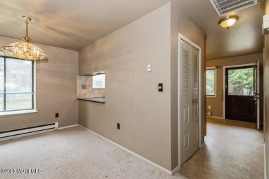 Welcome Home to Covered Bridge II! This fantastic end unit on Pine Brook Golf Course in New Jersey - for sale on GolfHomes.com, golf home, golf lot