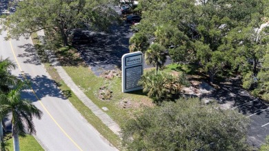 Nestled within the lush, park-like setting of The Meadows in on The Meadows Golf and Country Club in Florida - for sale on GolfHomes.com, golf home, golf lot