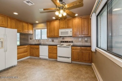 Welcome Home to Covered Bridge II! This fantastic end unit on Pine Brook Golf Course in New Jersey - for sale on GolfHomes.com, golf home, golf lot