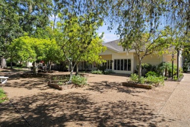 Nestled within the lush, park-like setting of The Meadows in on The Meadows Golf and Country Club in Florida - for sale on GolfHomes.com, golf home, golf lot