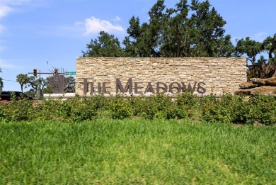 Nestled within the lush, park-like setting of The Meadows in on The Meadows Golf and Country Club in Florida - for sale on GolfHomes.com, golf home, golf lot
