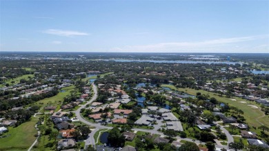 Nestled within the lush, park-like setting of The Meadows in on The Meadows Golf and Country Club in Florida - for sale on GolfHomes.com, golf home, golf lot
