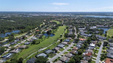 Nestled within the lush, park-like setting of The Meadows in on The Meadows Golf and Country Club in Florida - for sale on GolfHomes.com, golf home, golf lot