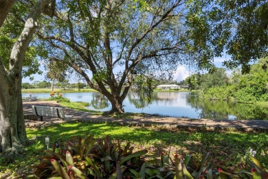 Nestled within the lush, park-like setting of The Meadows in on The Meadows Golf and Country Club in Florida - for sale on GolfHomes.com, golf home, golf lot