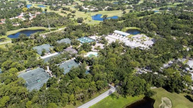 Nestled within the lush, park-like setting of The Meadows in on The Meadows Golf and Country Club in Florida - for sale on GolfHomes.com, golf home, golf lot