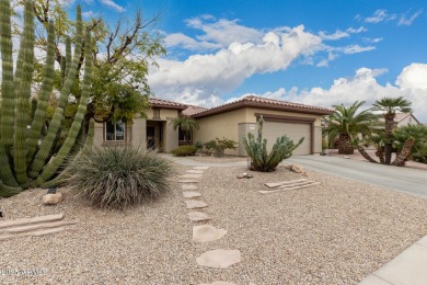 Charming Cactus Flower model in the highly sought-after on Sun City Grand Golf Couse and Club in Arizona - for sale on GolfHomes.com, golf home, golf lot