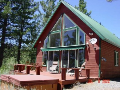 WOW!  For someone wants a cabin in the woods for their sweet on Grizzly Ranch Golf Club in California - for sale on GolfHomes.com, golf home, golf lot