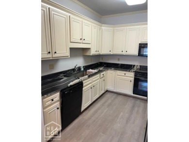 Welcome home to 4000 RidgePointe Cove, a 2-bedroom 2 bath condo on RidgePointe Country Club in Arkansas - for sale on GolfHomes.com, golf home, golf lot