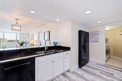 Back on the market with a NEW PRICE, A NEW LOOK AND A BEAUTIFUL on Isla Del Sol Yacht and Country Club in Florida - for sale on GolfHomes.com, golf home, golf lot