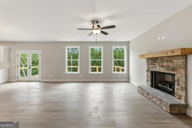 Welcome Home to 29 Creekview Drive! This stunning Alexander on The Plantation Golf Club in Georgia - for sale on GolfHomes.com, golf home, golf lot