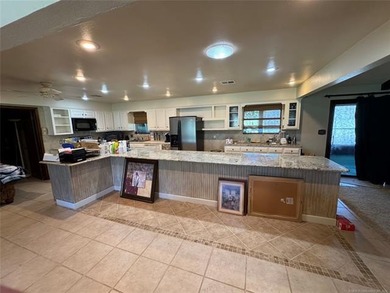 Welcome to 50 Fairway Drive, located inside Falconhead Resort in on Falconhead Resort and Country Club in Oklahoma - for sale on GolfHomes.com, golf home, golf lot