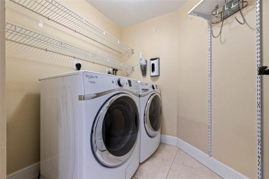 Back on the market with a NEW PRICE, A NEW LOOK AND A BEAUTIFUL on Isla Del Sol Yacht and Country Club in Florida - for sale on GolfHomes.com, golf home, golf lot