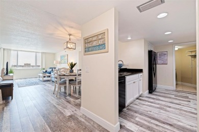 Back on the market with a NEW PRICE, A NEW LOOK AND A BEAUTIFUL on Isla Del Sol Yacht and Country Club in Florida - for sale on GolfHomes.com, golf home, golf lot