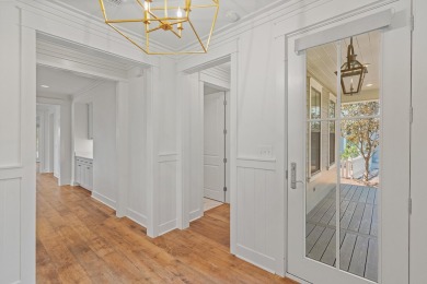 Nestled in the highly sought-after, master-planned community of on Origins Golf Club in Florida - for sale on GolfHomes.com, golf home, golf lot