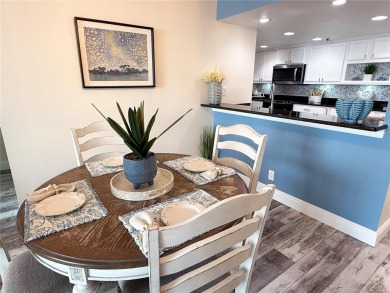 Back on the market with a NEW PRICE, A NEW LOOK AND A BEAUTIFUL on Isla Del Sol Yacht and Country Club in Florida - for sale on GolfHomes.com, golf home, golf lot