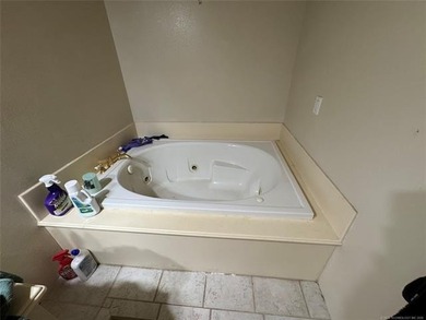 Welcome to 50 Fairway Drive, located inside Falconhead Resort in on Falconhead Resort and Country Club in Oklahoma - for sale on GolfHomes.com, golf home, golf lot