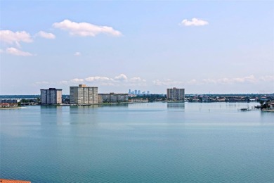 Back on the market with a NEW PRICE, A NEW LOOK AND A BEAUTIFUL on Isla Del Sol Yacht and Country Club in Florida - for sale on GolfHomes.com, golf home, golf lot