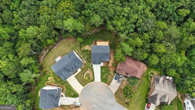 Welcome Home to 29 Creekview Drive! This stunning Alexander on The Plantation Golf Club in Georgia - for sale on GolfHomes.com, golf home, golf lot