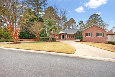 Welcome to this gorgeous 3-bedroom, 2.5-bathroom brick home with on Woodside Plantation Country Club in South Carolina - for sale on GolfHomes.com, golf home, golf lot