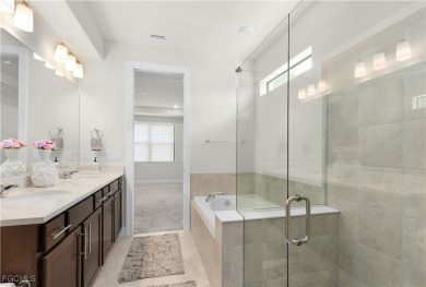 Welcome to your dream home in Hampton Lakes! This stunning on River Hall Country Club in Florida - for sale on GolfHomes.com, golf home, golf lot