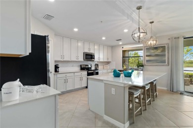 Welcome to your oasis in the heart of the esteemed Sarasota on Sarasota National Golf Club in Florida - for sale on GolfHomes.com, golf home, golf lot