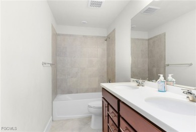 Welcome to your dream home in Hampton Lakes! This stunning on River Hall Country Club in Florida - for sale on GolfHomes.com, golf home, golf lot