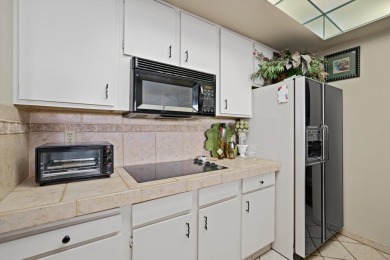 Spacious First-Floor Condo with Mountain Views in Desert Island

 on Desert Island Golf and Country Club in California - for sale on GolfHomes.com, golf home, golf lot