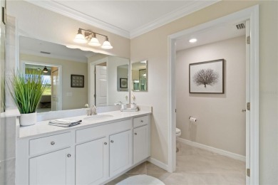 Welcome to your oasis in the heart of the esteemed Sarasota on Sarasota National Golf Club in Florida - for sale on GolfHomes.com, golf home, golf lot