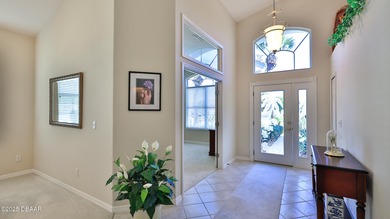 This meticulously maintained 3 BR 2 BA home is offered furnished on Plantation Bay Golf and Country Club in Florida - for sale on GolfHomes.com, golf home, golf lot