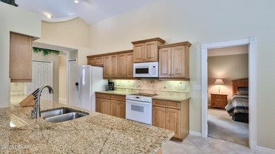 This meticulously maintained 3 BR 2 BA home is offered furnished on Plantation Bay Golf and Country Club in Florida - for sale on GolfHomes.com, golf home, golf lot