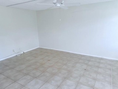 1st floor corner 2 bedroom,2 bath quiet Tilford location on Hillsboro Pines Golf in Florida - for sale on GolfHomes.com, golf home, golf lot