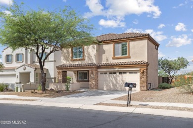 Located in Rancho Vistoso, this Elevation C Plan with Stone sits on The Golf Club at Vistoso in Arizona - for sale on GolfHomes.com, golf home, golf lot