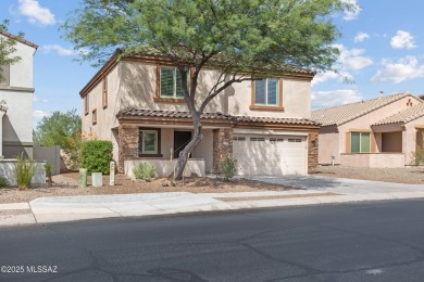 Located in Rancho Vistoso, this Elevation C Plan with Stone sits on The Golf Club at Vistoso in Arizona - for sale on GolfHomes.com, golf home, golf lot
