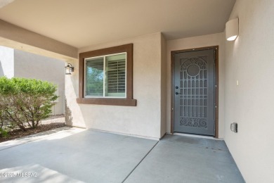 Located in Rancho Vistoso, this Elevation C Plan with Stone sits on The Golf Club at Vistoso in Arizona - for sale on GolfHomes.com, golf home, golf lot