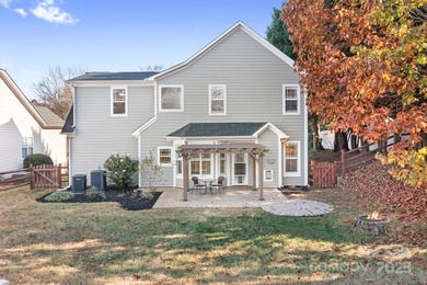 This beautifully-maintained 4-bedroom home with a welcoming on The Peninsula Club in North Carolina - for sale on GolfHomes.com, golf home, golf lot