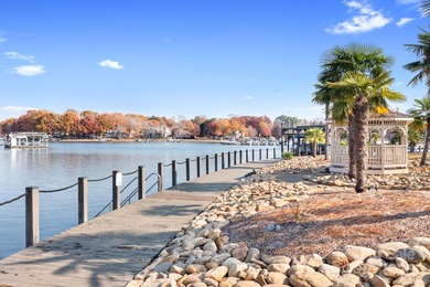 This beautifully-maintained 4-bedroom home with a welcoming on The Peninsula Club in North Carolina - for sale on GolfHomes.com, golf home, golf lot
